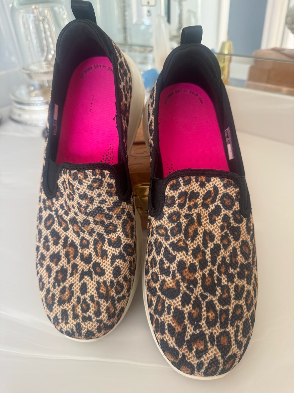 Sketchers Leopard Print Slip-On Sneakers with Hot Pink Insoles US9